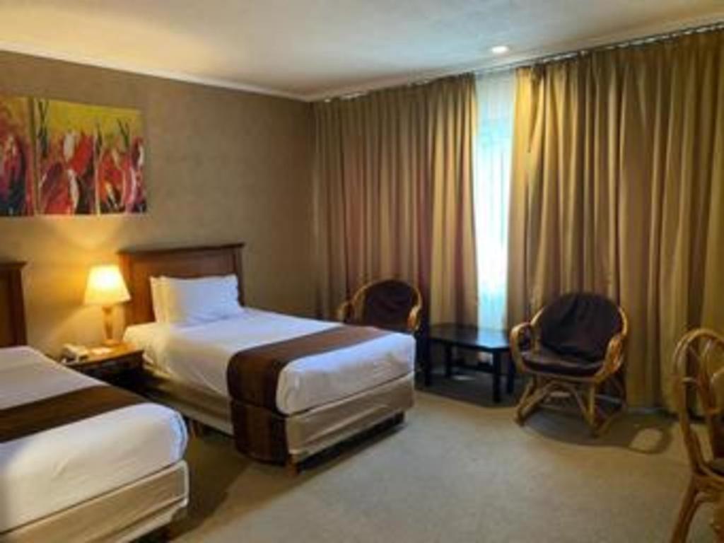 Regent'S Park Hotel Маланг Екстер'єр фото